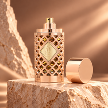 Ard Al Zaafaran Jazzab Rose Gold Eau de Parfum 100ml – bottle on sculptural stone