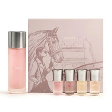 Assaf luxury perfume gift set with pink Arrogate bottle and mini fragrances, elegant horse-themed packaging