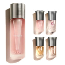 Arabian oud perfume collection with pink and gold fragrances in sleek glass bottles